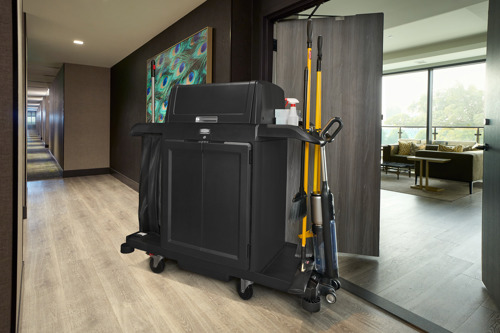 Closed housekeeping cart with hood and doors, with mops and vacuum in stick good holders